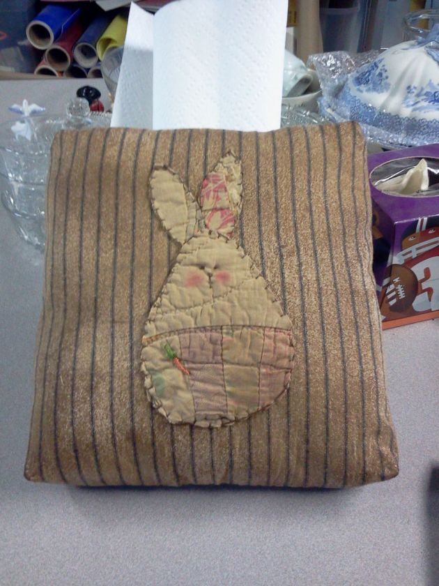 Handmade Primitive looking pillow for Easter with old quilt bunny 